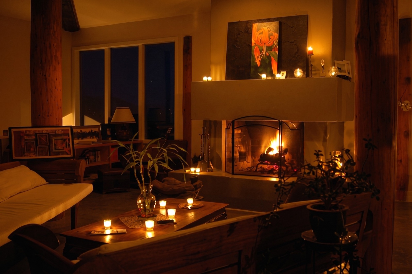 The lodge lit from inside in the evening