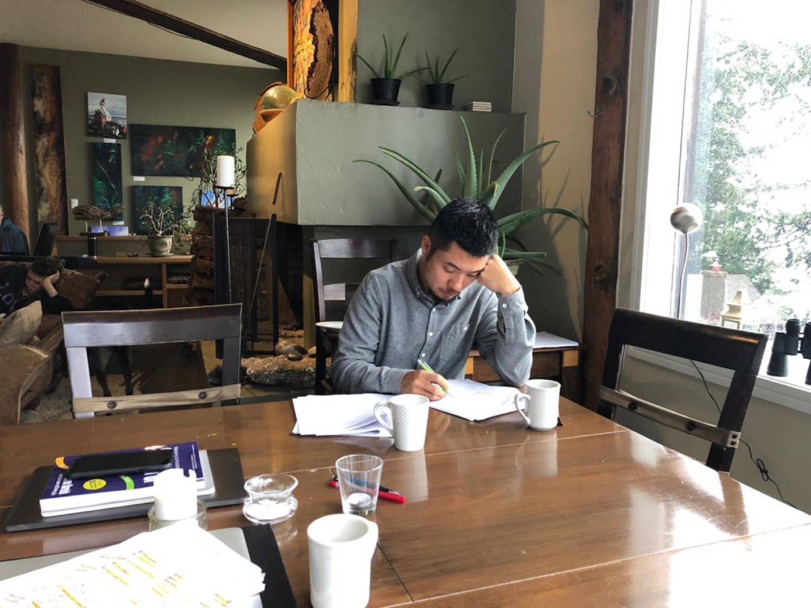 Someone working at a table at Craidelonna